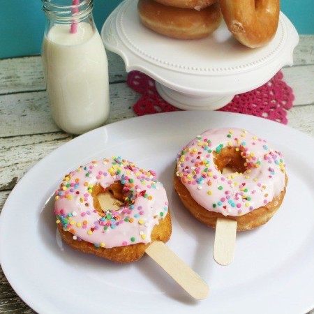 These fun and easy doughnut pops are the perfect weekend treat! Purchase doughnuts and prepare some quick homemade frosting, sprinkles are optional!