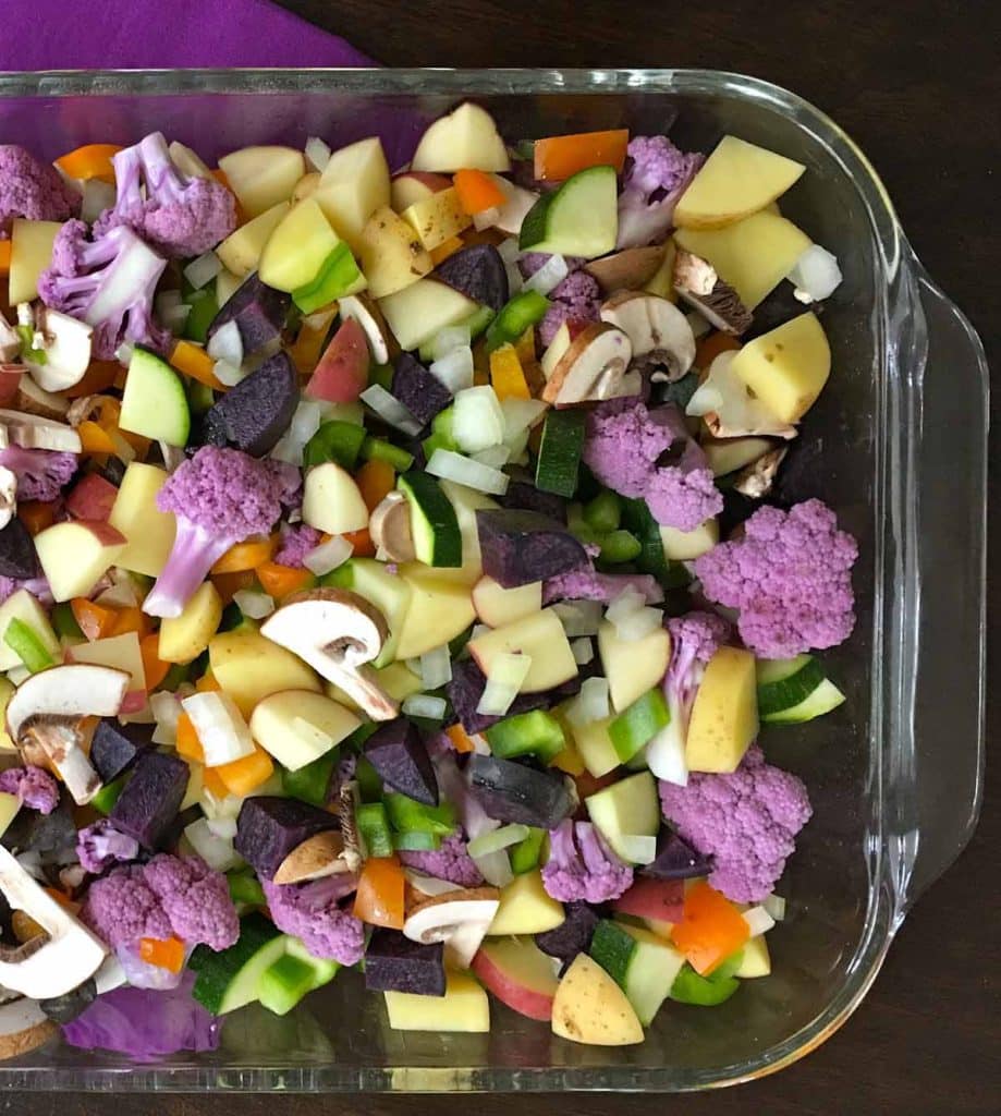 glass baking dish with colorful raw vegetables