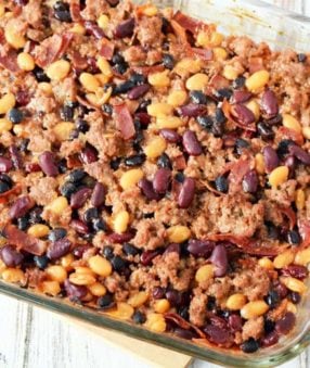 This homemade healthy baked beans with ground turkey literally makes the best baked beans I've ever had–it's an old family recipe that I've lightened up a bit with turkey, turkey bacon, and a homemade pork and beans recipe instead of the canned stuff. 