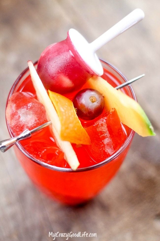 top down view of a cocktail with an ice pop in it