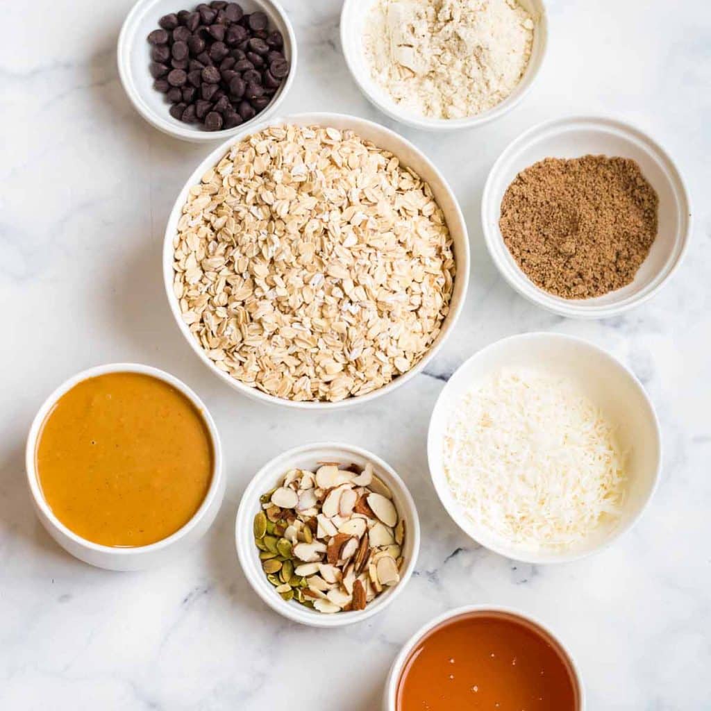 small bowls with ingredients in them to make Healthy Homemade Granola Bars