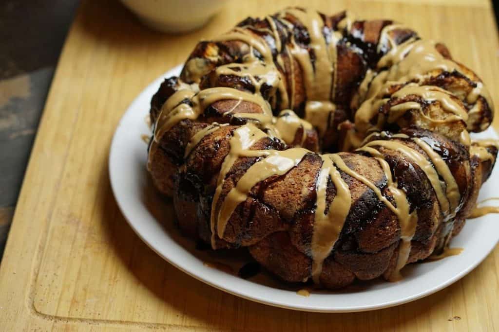 baked Peanut Butter Cup Monkey Bread on a white plate