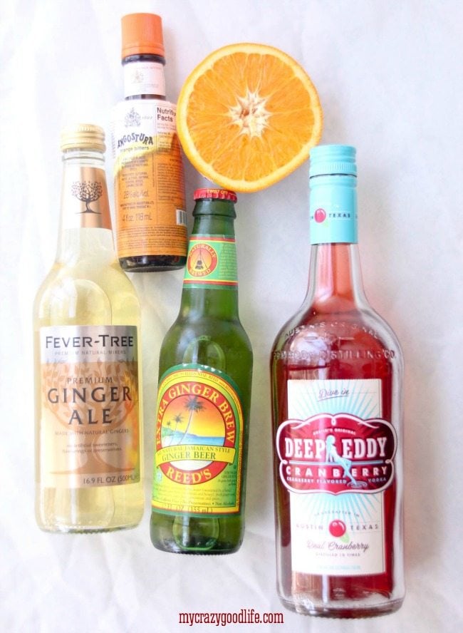 This Ginger Cranberry Mule is the perfect Happy Hour cocktail. Cranberry Vodka, Ginger Beer, Orange Juice, and a splash of Angostura Orange Bitters makes this Mule refreshing and delicious! 