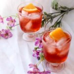 This Ginger Cranberry Mule is the perfect Happy Hour cocktail. Cranberry Vodka, Ginger Beer, Orange Juice, and a splash of Angostura Orange Bitters makes this Mule refreshing and delicious!