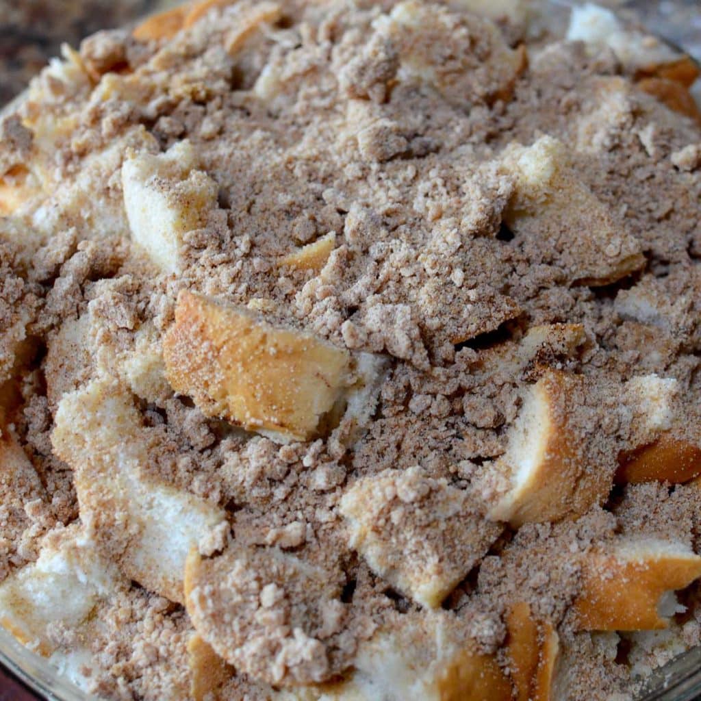 Cubed bread that is covered with a cinnamon sugar and butter topping.