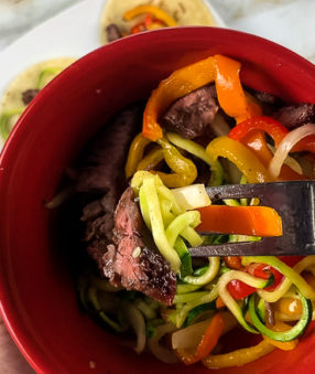 bowl of fajitas with zoodles