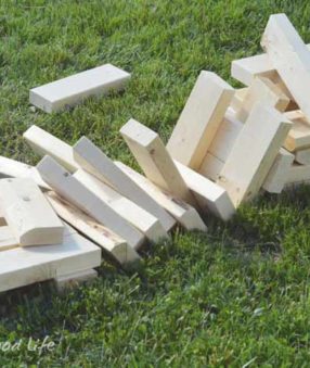 You can easily build this backyard game DIY Giant Jenga for your next party or picnic. There are only a few supplies needed, and it's a great family game!