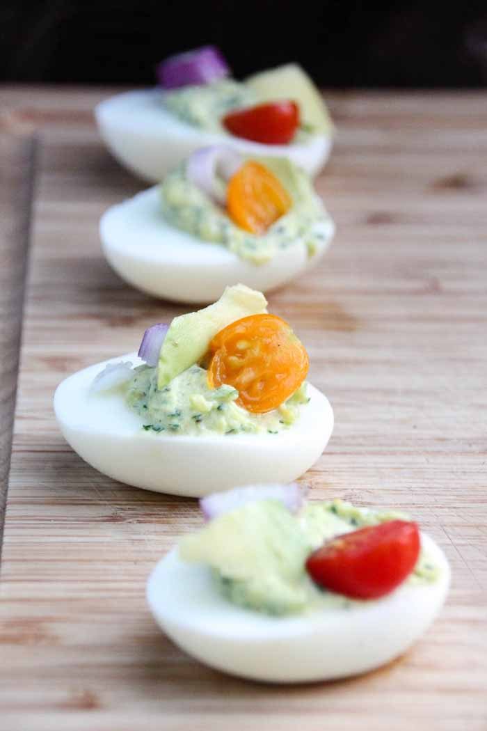 Everyone loves a good party food, Herbed Deviled Eggs are a great twist on a classic party finger food! They're delicious, savory, and beautiful displayed.