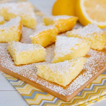3 Ingredient Lemon Bars from Cake Mix on wood cutting board