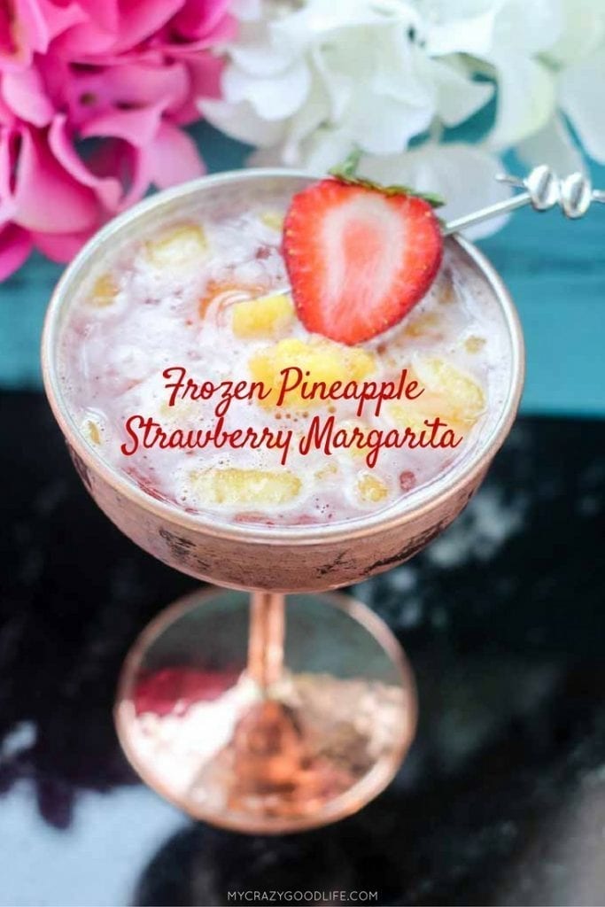 It can be summer everyday with this delicious frozen margarita recipe–it's a Frozen Pineapple Strawberry Margarita. Cool off or chill out with this tasty summer margarita recipe!