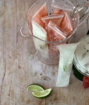 top down image of strawberry margarita popsicles in a pitcher