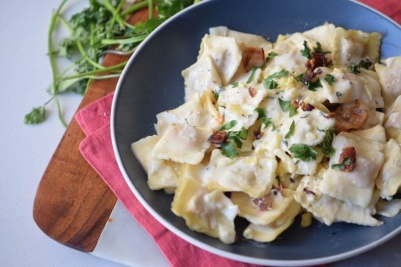 This Creamy Asiago Ravioli has all you expect from a good Italian recipe, it's easy to do, a total crowd pleaser, and out of this world good.