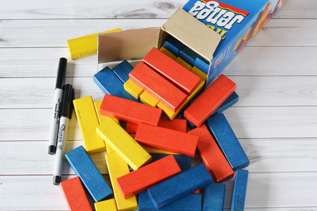 Turn your boring, regular game into an amazingly entertaining DIY Family Jenga! Everyone will be thinking, moving, and laughing before you know it!