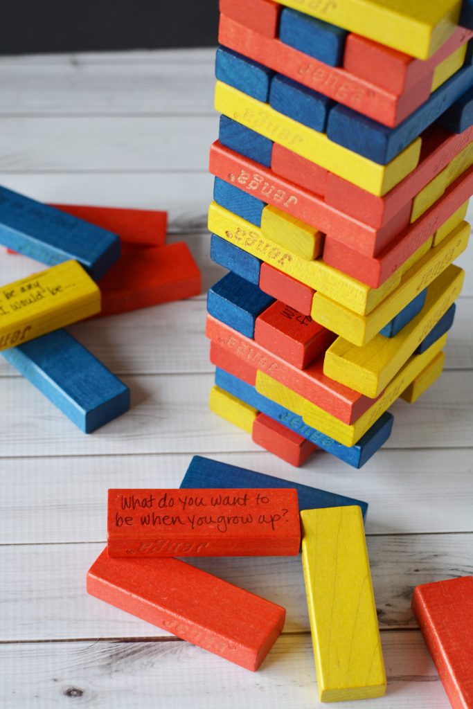 Turn your boring, regular game into an amazingly entertaining DIY Family Jenga! Everyone will be thinking, moving, and laughing before you know it!