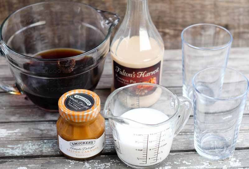 This Bourbon & Pumpkin Pie Iced Coffee is the perfect drink for fall! Served it iced or warm for those chilly fall evenings. It's the perfect amount of pumpkin! 