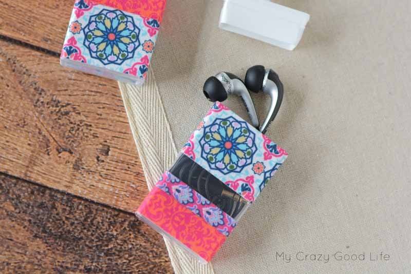 This quick and easy DIY Earbud Holder is a perfect way to store your earbuds. As a bonus, it's super easy to see at the bottom of your backpack or purse!