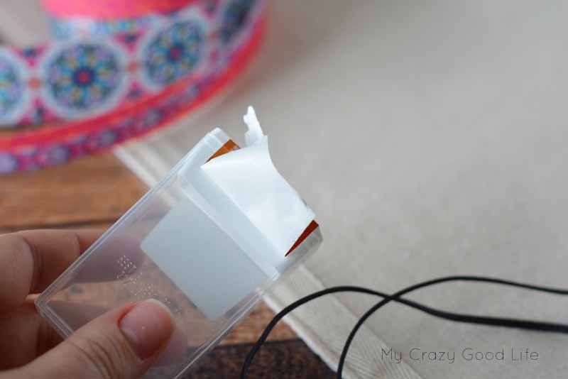 This quick and easy DIY Earbud Holder is a perfect way to store your earbuds. As a bonus, it's super easy to see at the bottom of your backpack or purse!