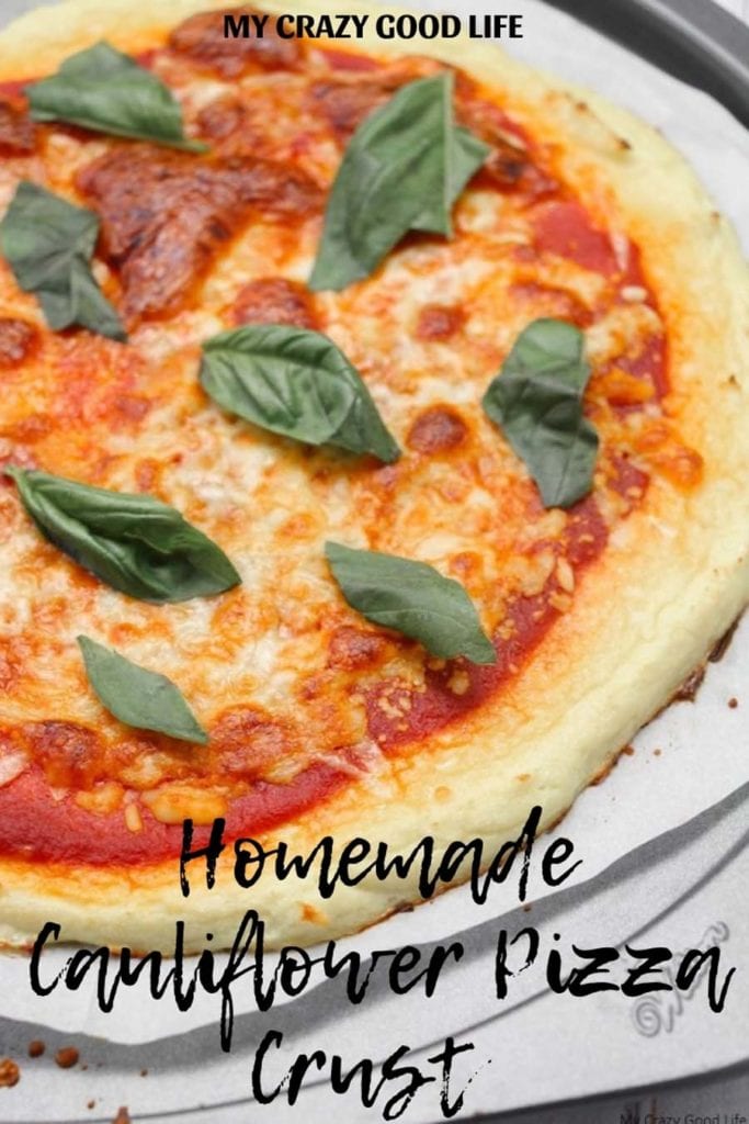 This low carb cauliflower pizza crust is a family favorite! It uses only 3 ingredients and is so easy to make on pizza night! 21 Day Fix Friendly.