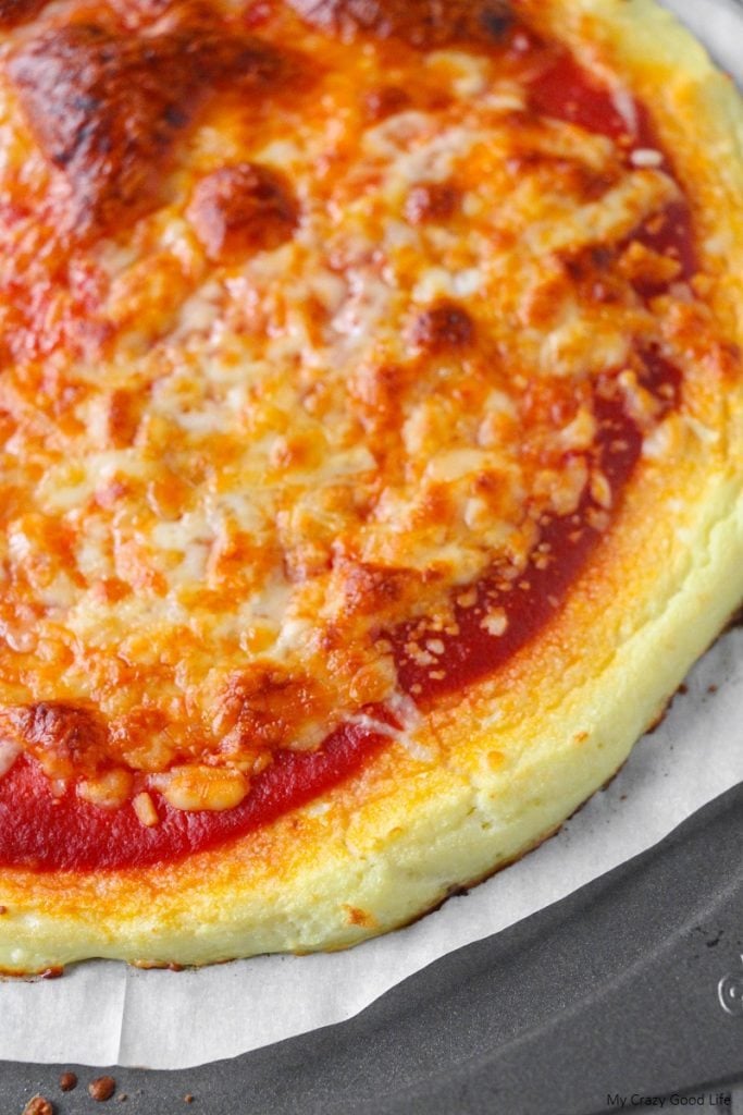This low carb cauliflower pizza crust is a family favorite! It uses only 3 ingredients and is so easy to make on pizza night! 