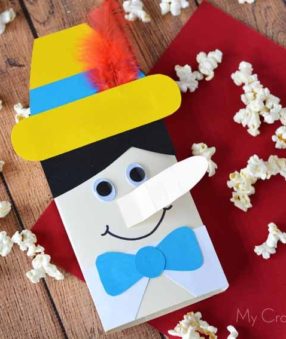 This easy Pinocchio party craft will help you enjoy movie night! Don't forget to grab Pinocchio on Blu Ray today!