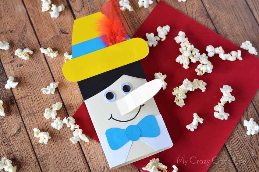 This easy Pinocchio party craft will help you enjoy movie night! Don't forget to grab Pinocchio on Blu Ray today!