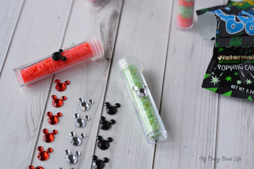 These DIY Fish Extenders are perfect for your next Disney Cruise! Vials full of edible pixie dust are perfect to give to little girls or families on a Disney Cruise.