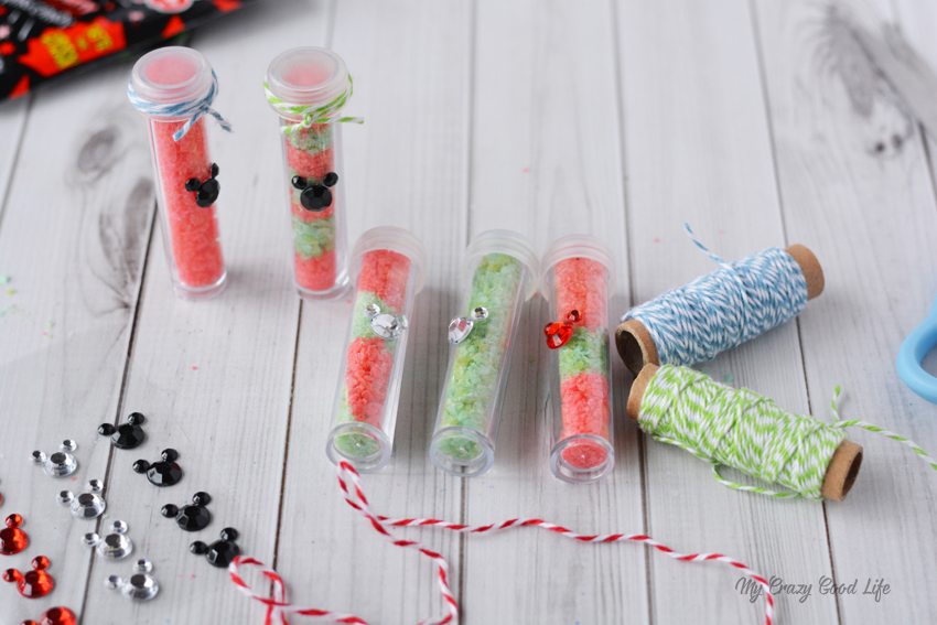 These DIY Fish Extenders are perfect for your next Disney Cruise! Vials full of edible pixie dust are perfect to give to little girls or families on a Disney Cruise.