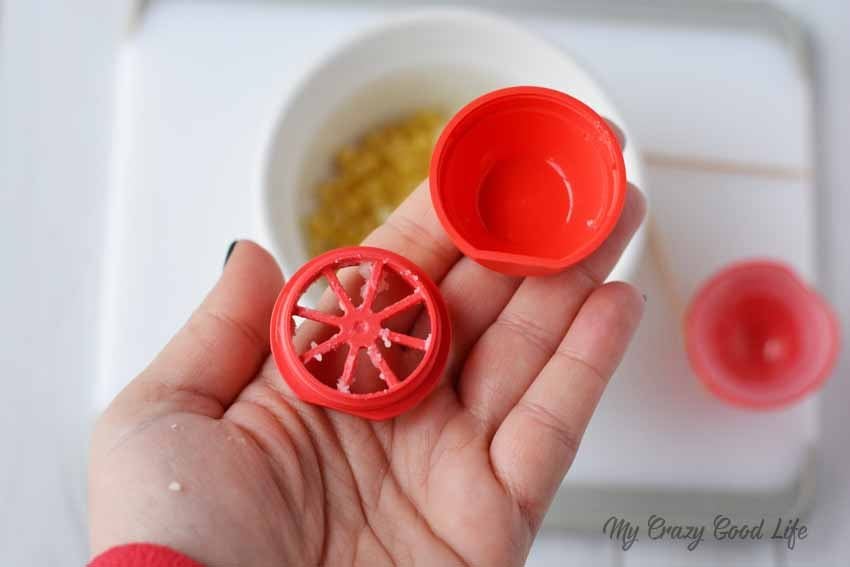 If you're having a Mickey party or are crafting some Fish Extenders for your Disney Cruise, this EOS DIY Mickey Mouse Lip Balm is the perfect craft.