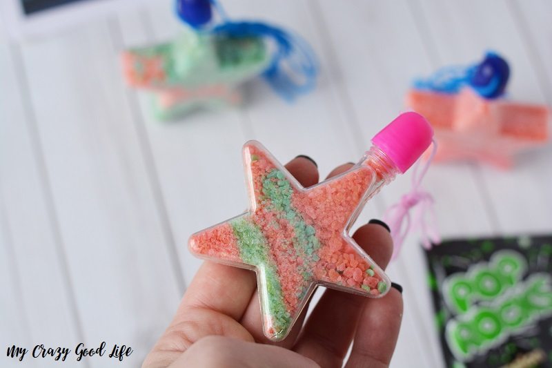 This Edible Fairy Dust Necklace craft is the perfect Disney Cruise Fish Extender gift, and so easy to make! Also great for a fairy party!