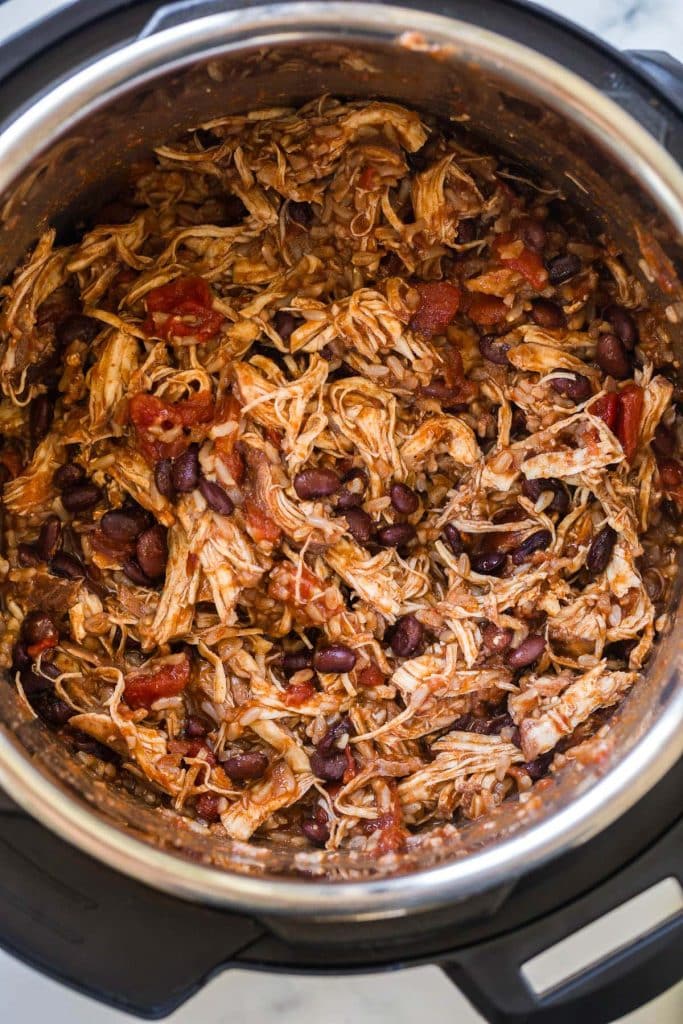 cooked Chicken Burrito Bowls inside an instant pot