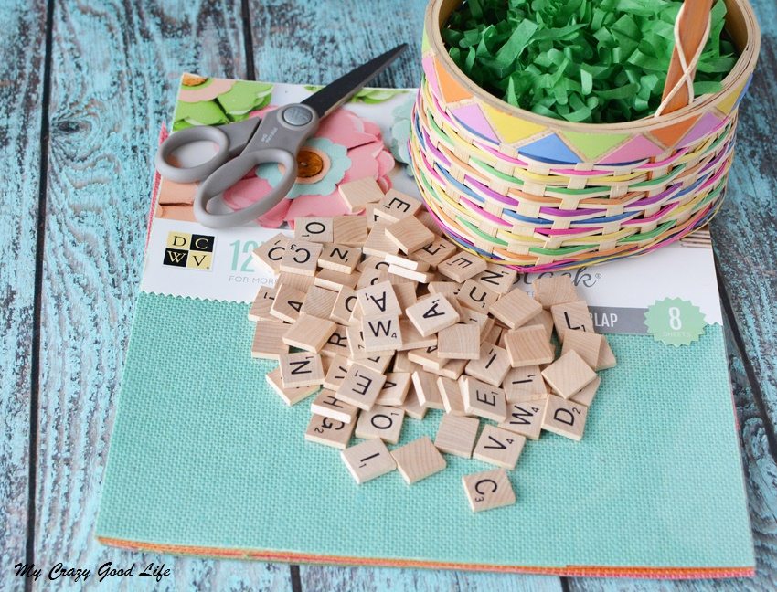 These adorable and customized Easter Baskets are the perfect Scrabble Tile Craft! They're an easy DIY Easter Basket that can be personalized several ways.