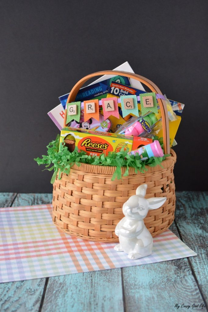 These adorable and customized Easter Baskets are the perfect Scrabble Tile Craft! They're an easy DIY Easter Basket that can be personalized several ways.