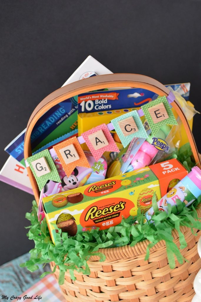 These adorable and customized Easter Baskets are the perfect Scrabble Tile Craft! They're an easy DIY Easter Basket that can be personalized several ways.