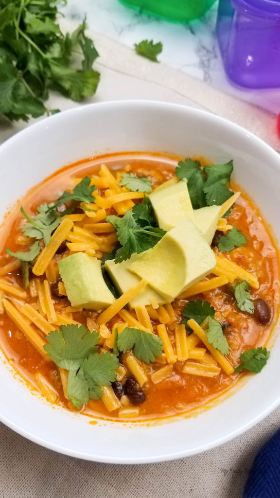 Sweet potato chili in a white bowl ready to eat.