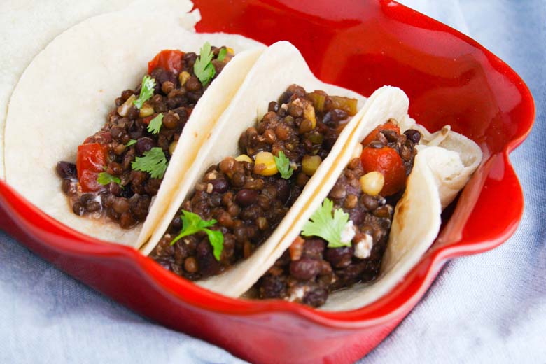 lentil tacos on red dish