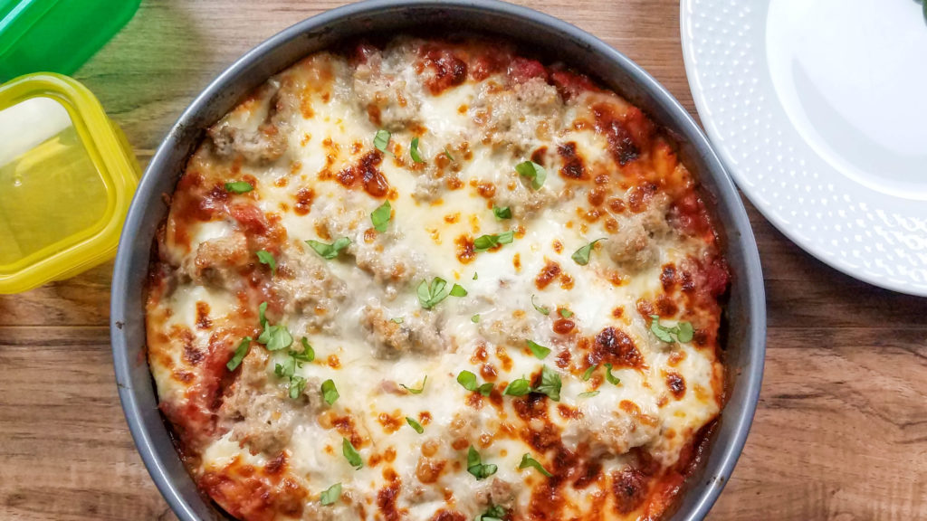 Instant Pot lasagna view from the top of the entire lasagna in a springform pan. 