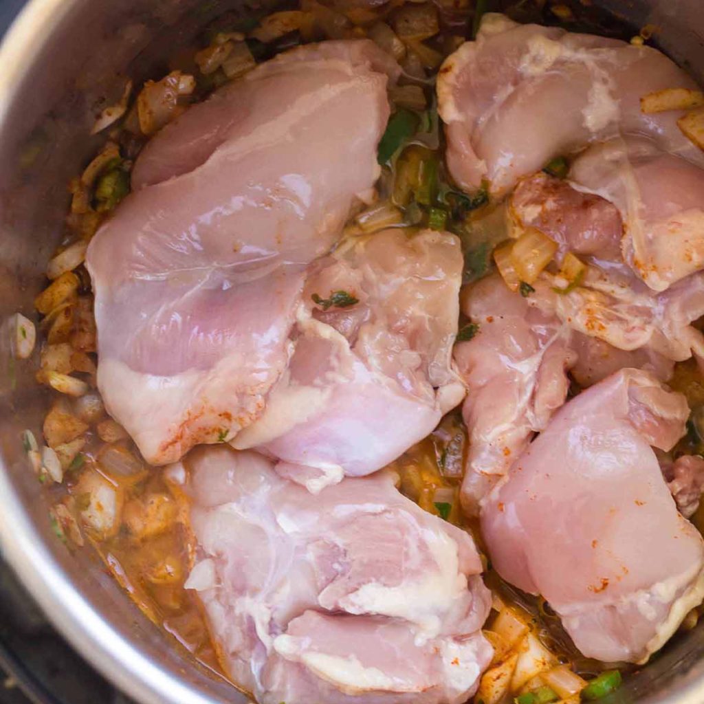 top down view of raw chicken thighs in the Instant Pot