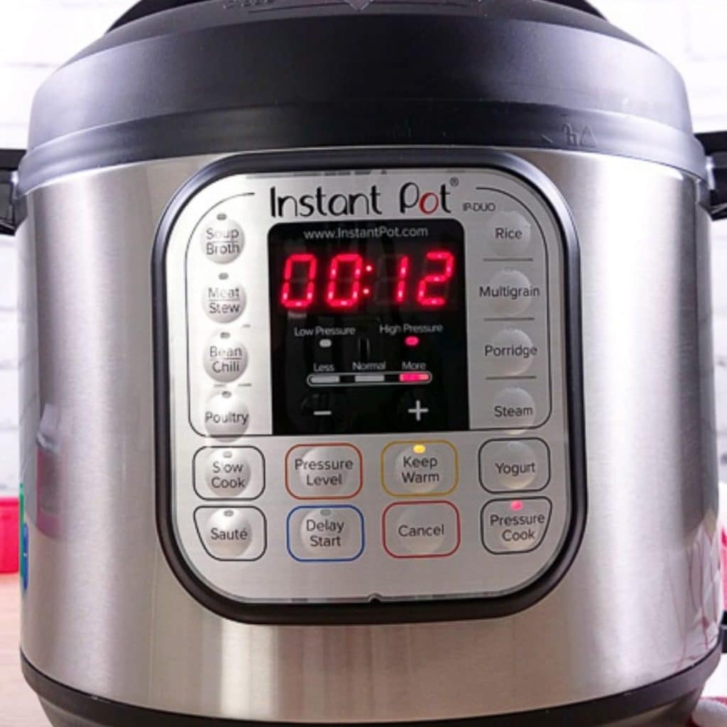 An instant pot showing a cook time of 12 minutes.
