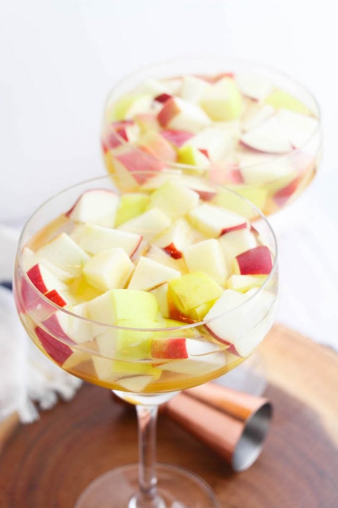 Delicious fresh apples cut up in the glasses to include in the apple cider margaritas. 