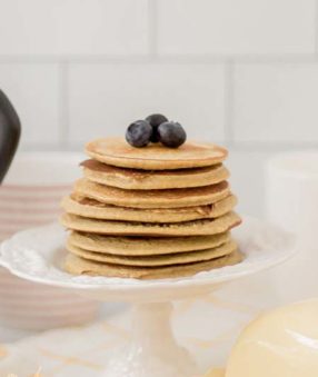 stack of pancakes with blueberries on top