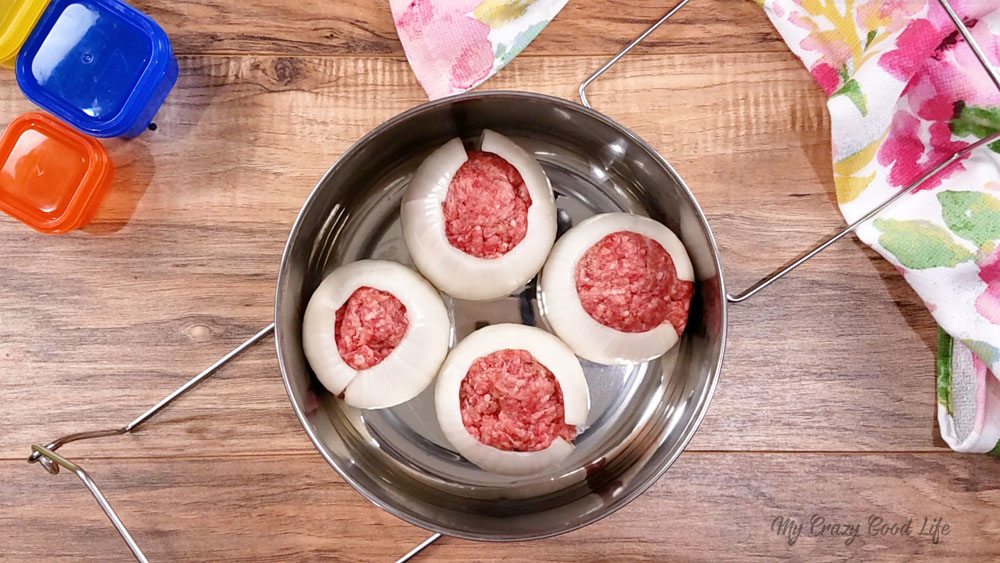 Arrange mini-meatloaves in a stackable pan.