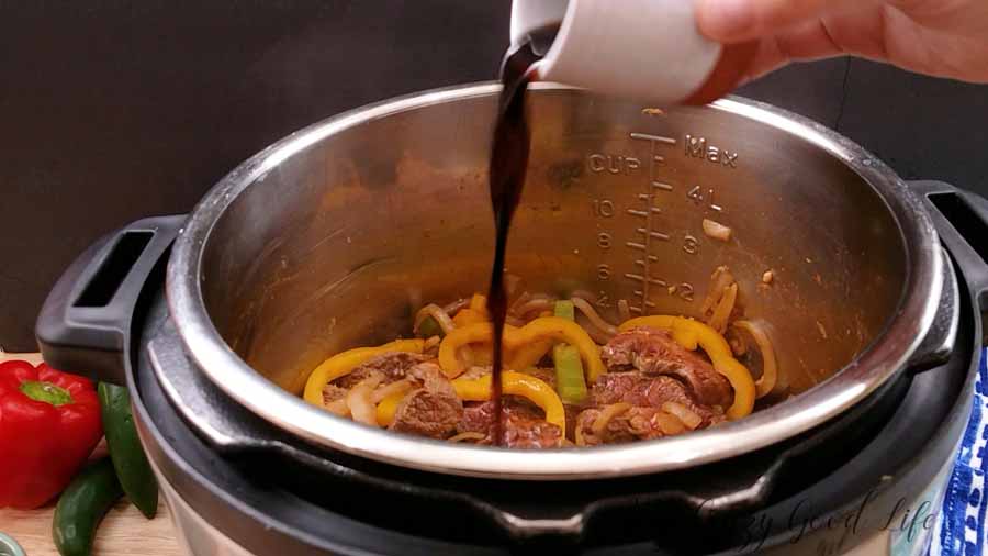 Add liquids to the Beef Fajita Bowls