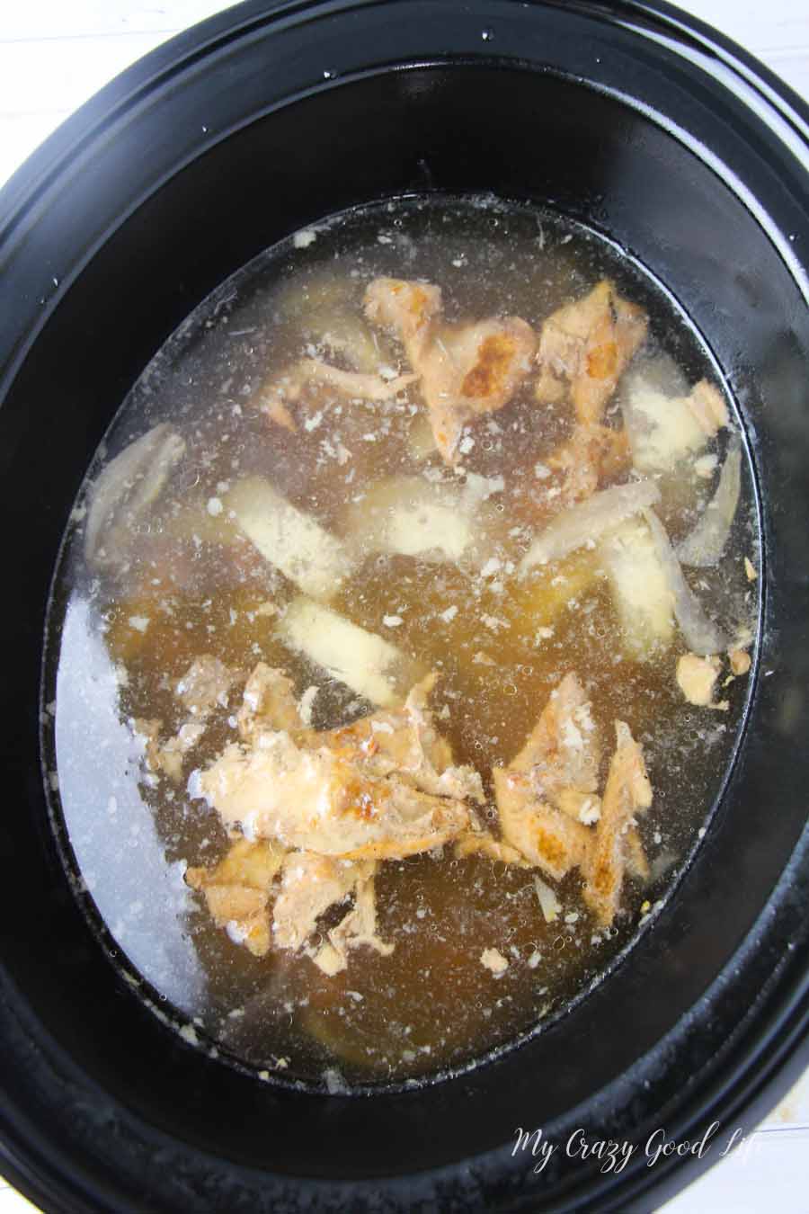 I'm sure you've seen the hype surrounding bone broth and the many health benefits it offers. It's also a really tasty base for a lot of my favorite recipes. This chicken bone broth recipe is super easy. I'm going to show you how to make bone broth in the Crockpot, it's a total game changer! #bonebroth #chickenbonebroth #recipes #crockpotrecipes