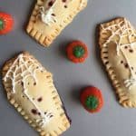 Homemade pop tarts that are shaped like coffins and filled with jelly.