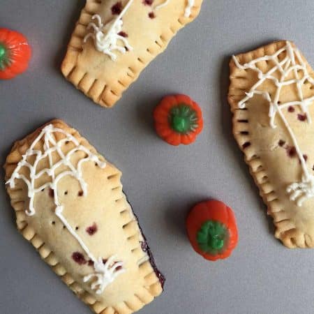 Homemade pop tarts that are shaped like coffins and filled with jelly.