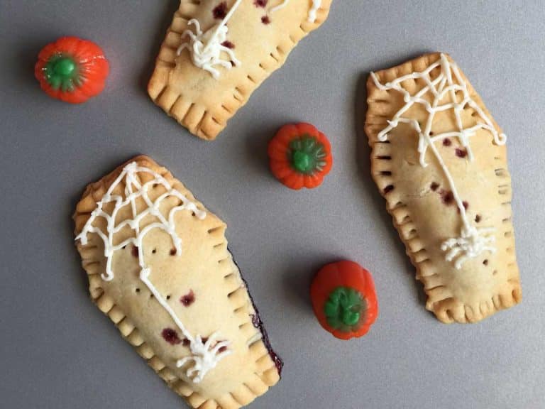 Homemade pop tarts that are shaped like coffins and filled with jelly.