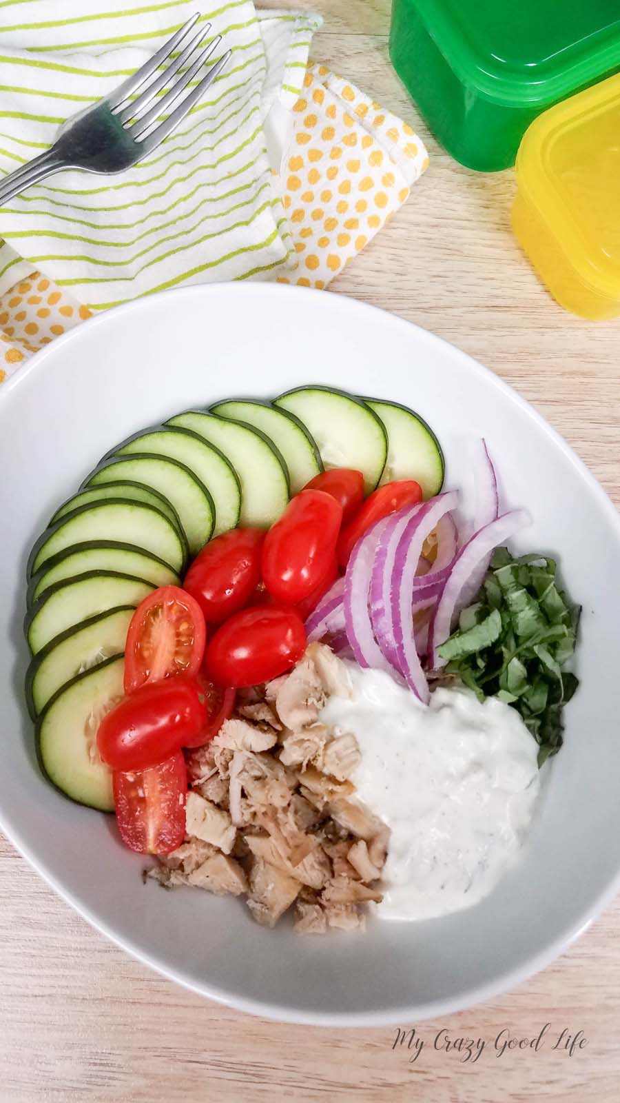 These healthy chicken gyro bowls with homemade tzatziki sauce are the perfect summer family meal! Delicious gyro chicken with fresh vegetables and homemade tzatziki sauce make this meal prep recipe one to save! #veggiesmost #2bmindset #21dayfix #mealprep #beachbody #dinnerrecipe #gyrobowl #healthydinner