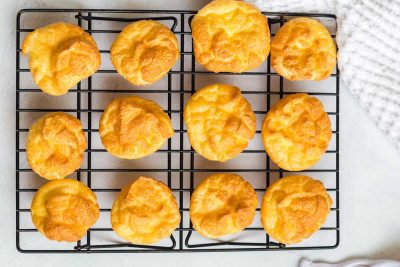 Image of cloud bread on a cooling rack. There are 12 pieces of cloud bread.
