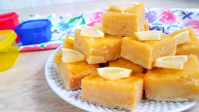 lemon bars on a white plate