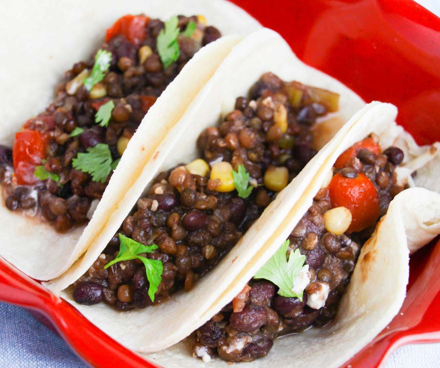 Instant Pot lentil tacos are a healthy dinner option! They're a great vegetarian taco recipe that is filling, fresh, and flavorful! The whole family will love these healthy lentil tacos. Lentil Tacos | Instant Pot Lentil Tacos | IP Tacos | Vegetarian Tacos #21DayFix #21DFX #2BMindset #healthyrecipes #dinnerrecipes